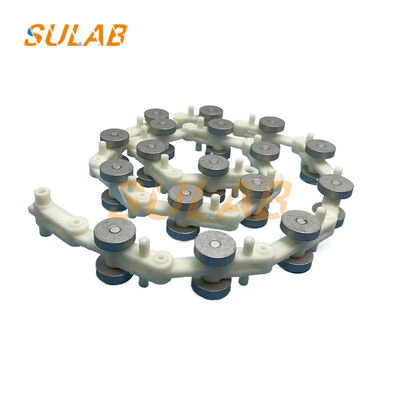 Xizi Otis एस्केलेटर स्लीविंग चेन XAA332DS 17-सेक्शन हैंडल और 50.5 मिमी पिच के साथ PA66 + 30%GF से बना